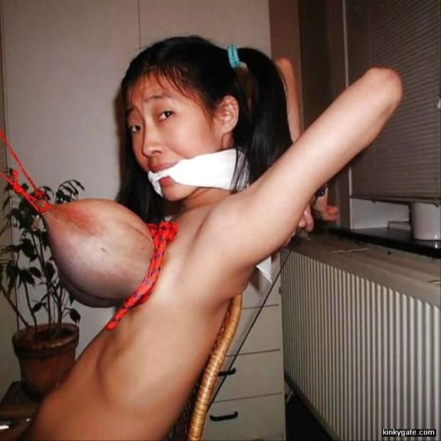 Asian slut with firmly tied tits