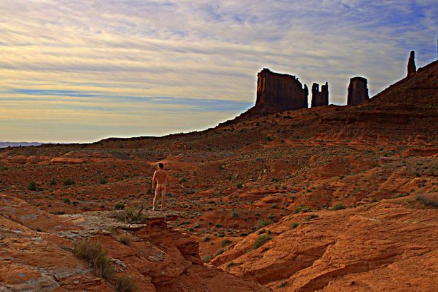 nude male in monument valley desert