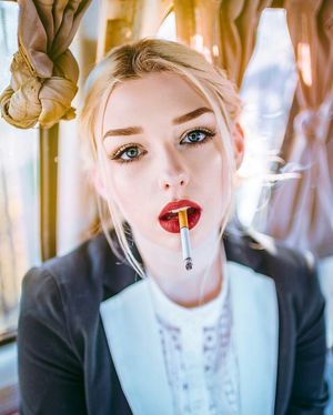 Blonde dangling cigarette