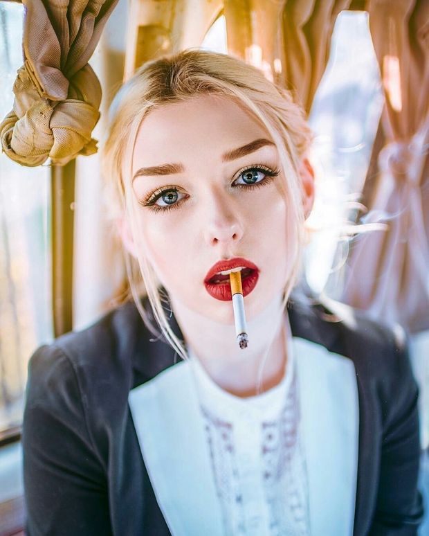 Blonde dangling cigarette