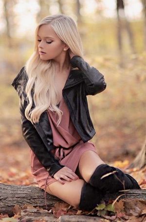 Keilih stafford, sitting amongst the leaves