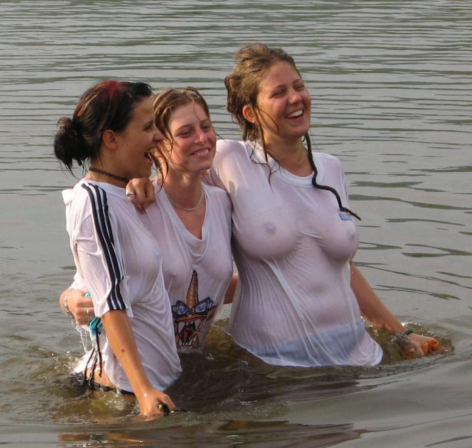 Three wet t-shirts in lake