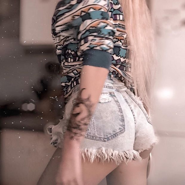 photo Ass in denim shorts without a face