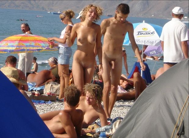 Naked  couple at public beach