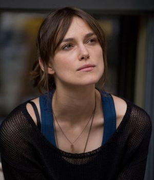 Keira Knightley watches a couple fuck in their second story apartment while she waits for the bus