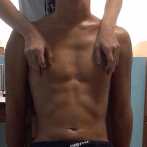 Flicking his nips :)