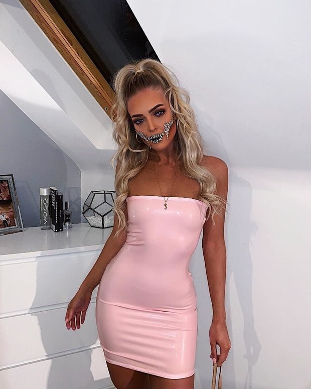 Sexy blonde in tight latex dress