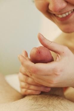 Cock in hand with a big smile