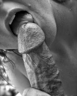 Licking his rock hard cock