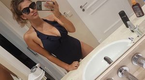 Busty teen in swimsuit