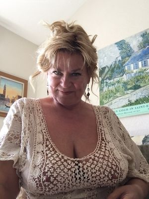 Braless mature big tits