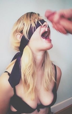 Wife taking cumshot while blindfolded