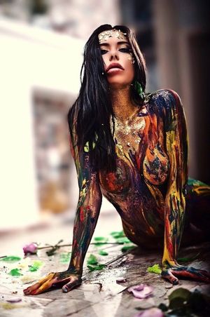 Gorgeous raven in body paint