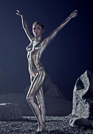 Miley Cyrus in silver body paint