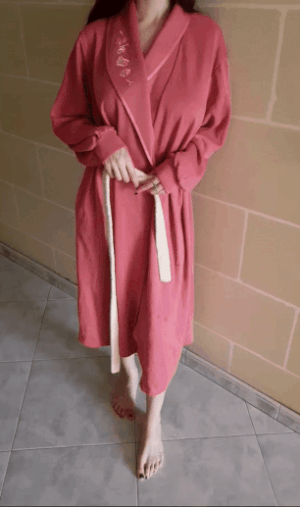 Unwrapping her robe