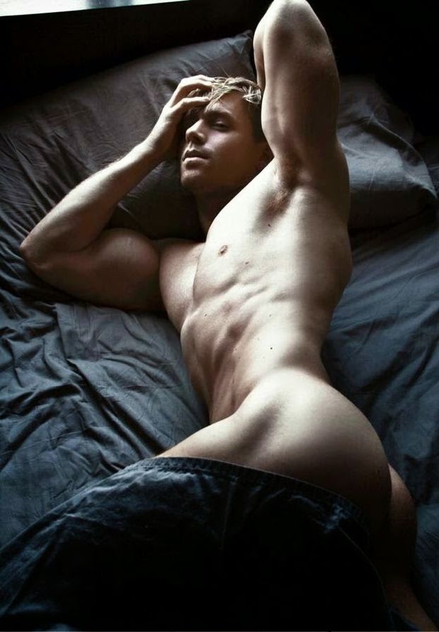 fit hot guy on bed