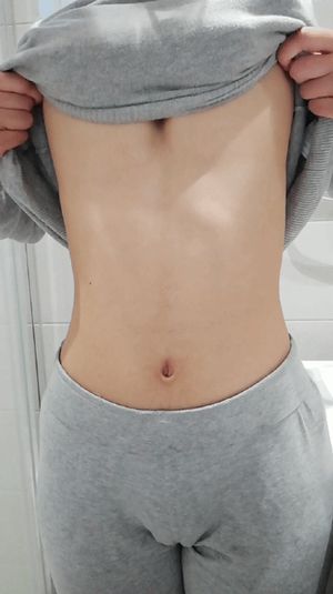 Hottie plays with her big boobs