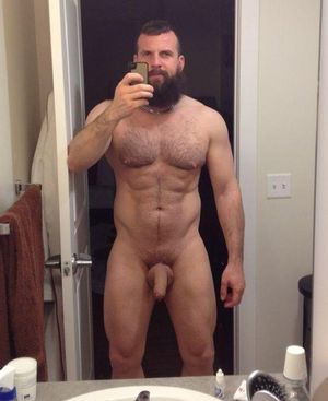 Hot bearded guy showing soft hanging cock