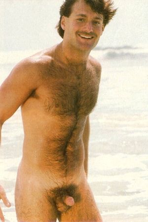 Cute hair guy on beach