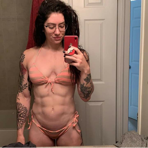 Muscular hot babe in bikini selfies