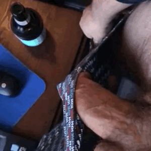 Hard cock popping out of shorts