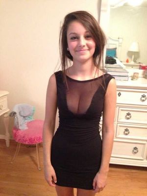 Shy teen in dress