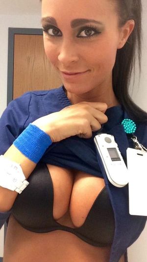 Working nurse flashes selfie