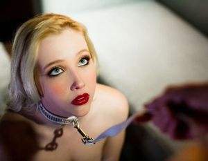 blonde slave with a collar is waiting for bdsm sex