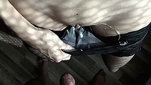 Pulling her panties with hot cum in them