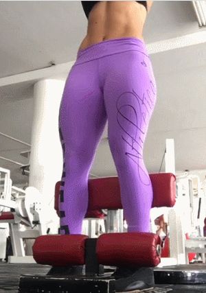 squating babes with sports bra