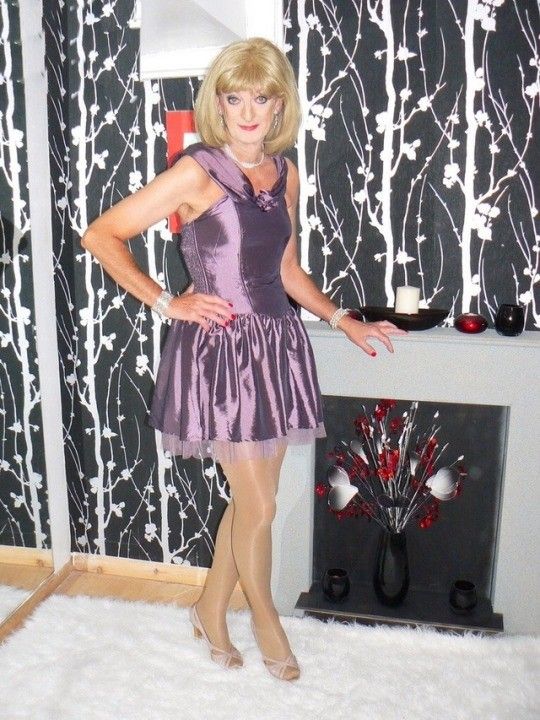Sexy mature CD in slut dress