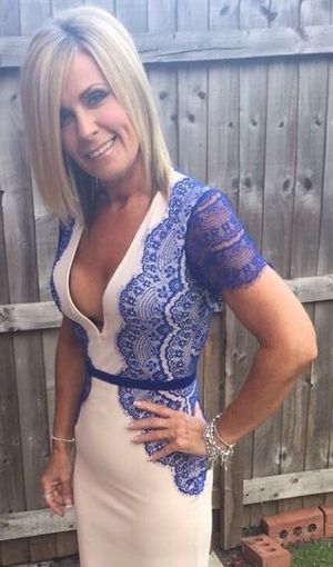 Sexy mom showing cleavage