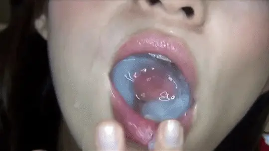 she has fun swirling her tongue in the sperm that fills her mouth