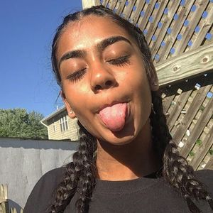 desi teen sticks tongue out for cum