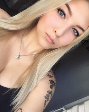 Some cleavage some tattoo