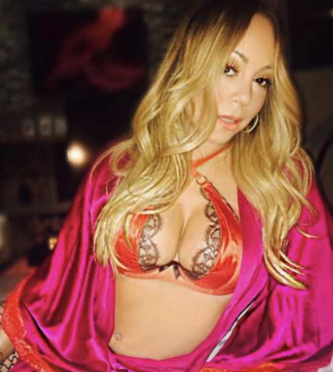 Mariah Carey with the perfect rack to give a titjob
