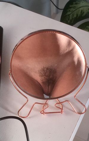 Pussy self-shot in a mirror