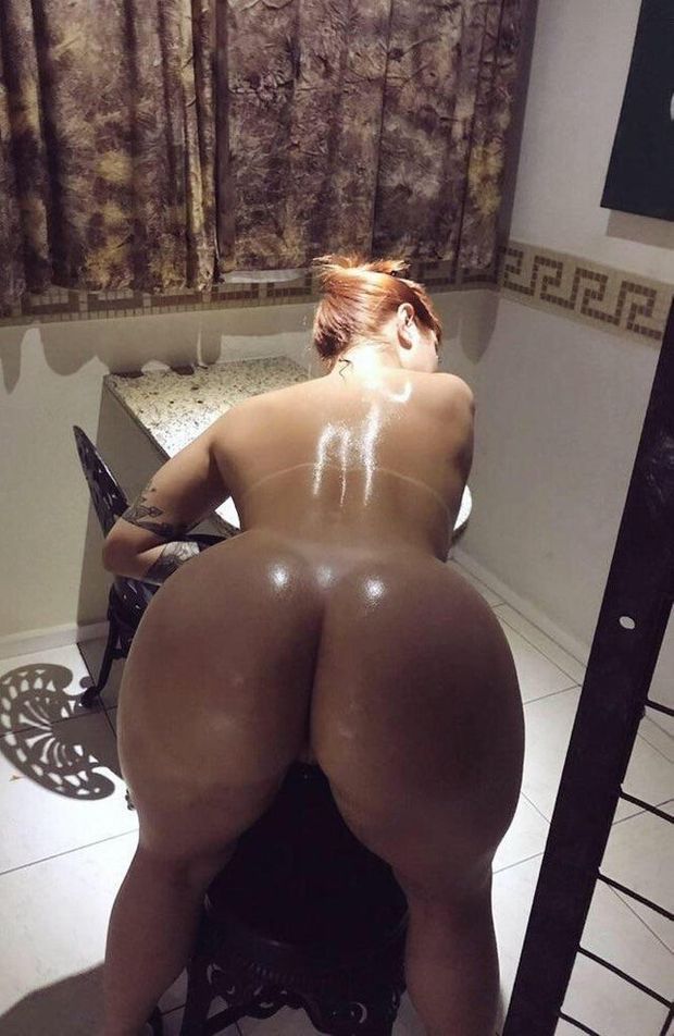 Oiled up bent over