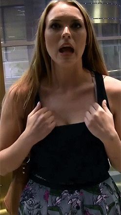 Cute babe flashes tits in public