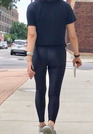 Asian teen in shiny leggings