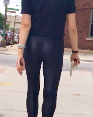 Asian teen in shiny leggings