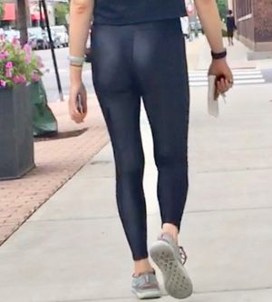 Asian teen in shiny leggings