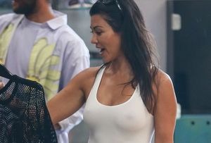 Braless celeb Kourtney Kardashian hard nipples in public