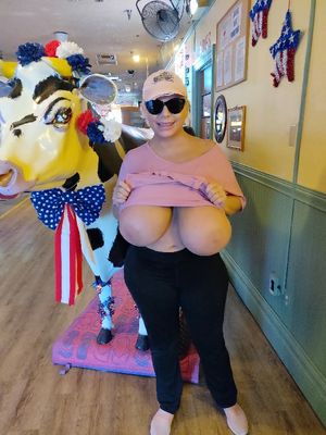 Claudia Marie flashes her giant saggy cow udders in a casino