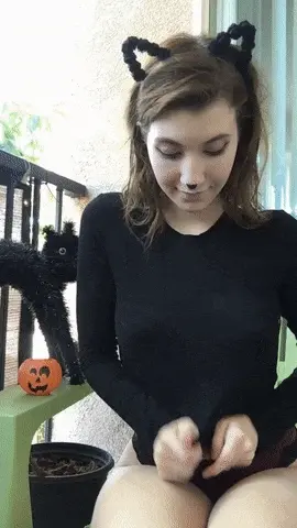 Cute kitty showing her tits