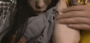 Holding up her panties