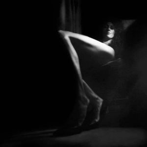 Light makes such perfect view of her beautiful long legs.