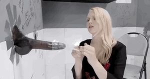 blonde teen removes condom from bbc emerging from glory hole