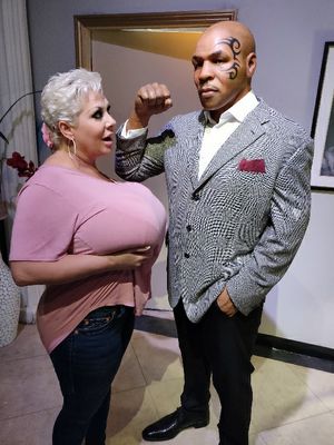 Claudia Marie offering up her huge saggers to Mike Tyson