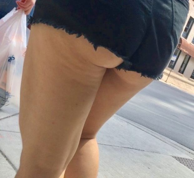 Thick Teen ass hangs out of shorts